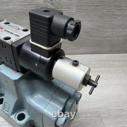 Nachi ESD-G06-C5250-E-E12 Hydraulic Directional Valve With EA64-D2-1A 24VDC Coils